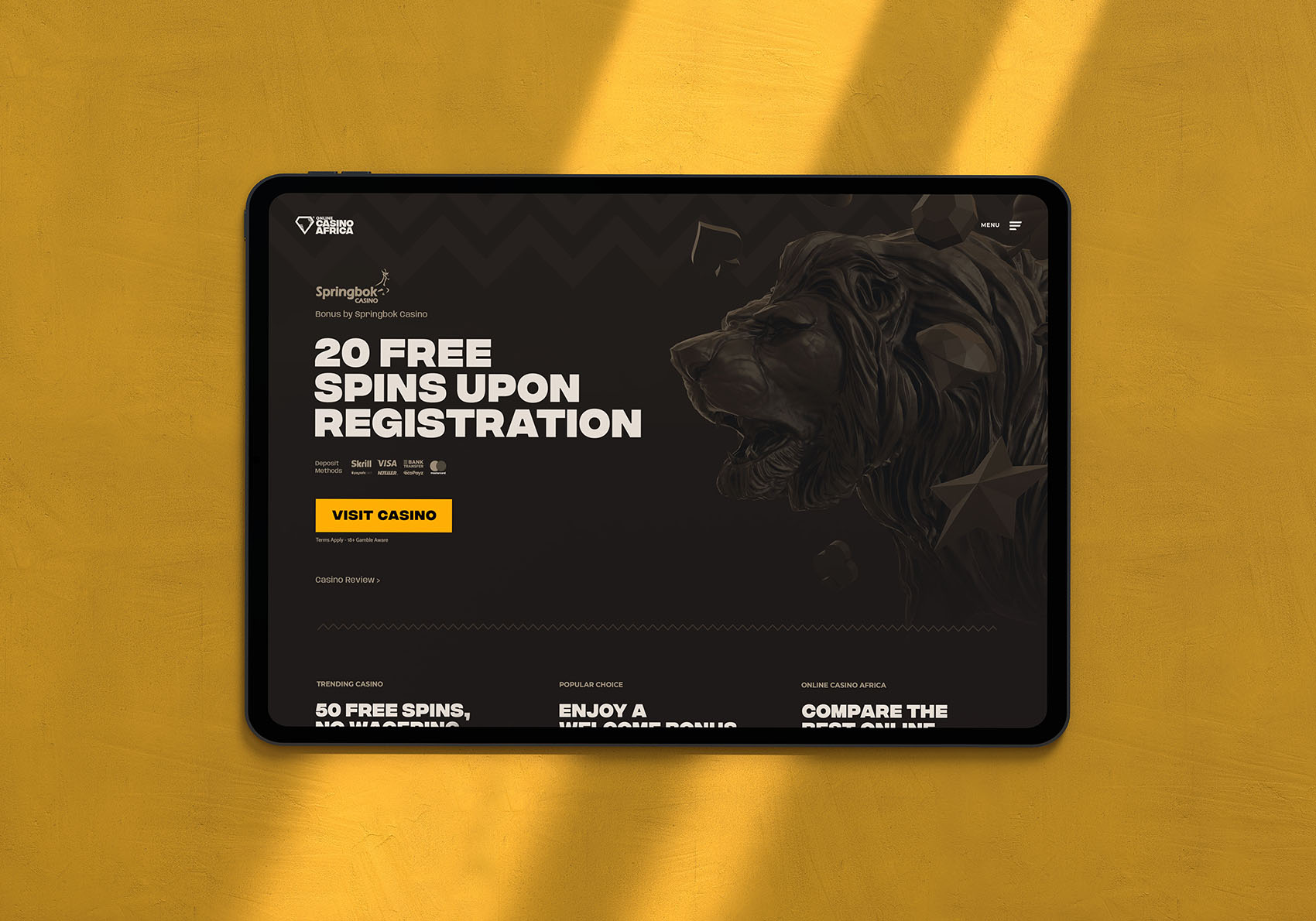 Online Casino Africa website in dark mode in an ipad on the floor
