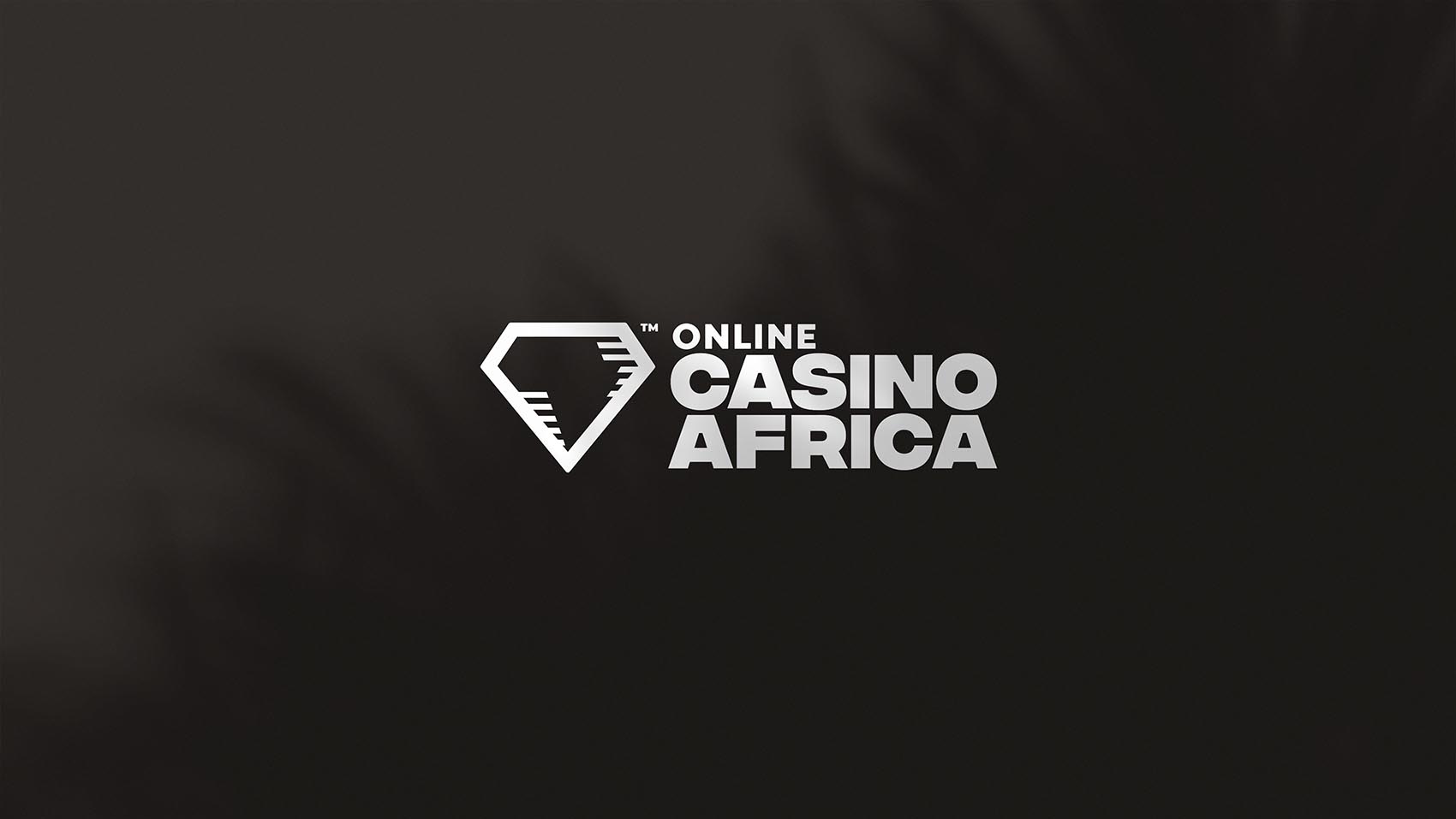 Online Casino Africa's logo on a wall with shadows.